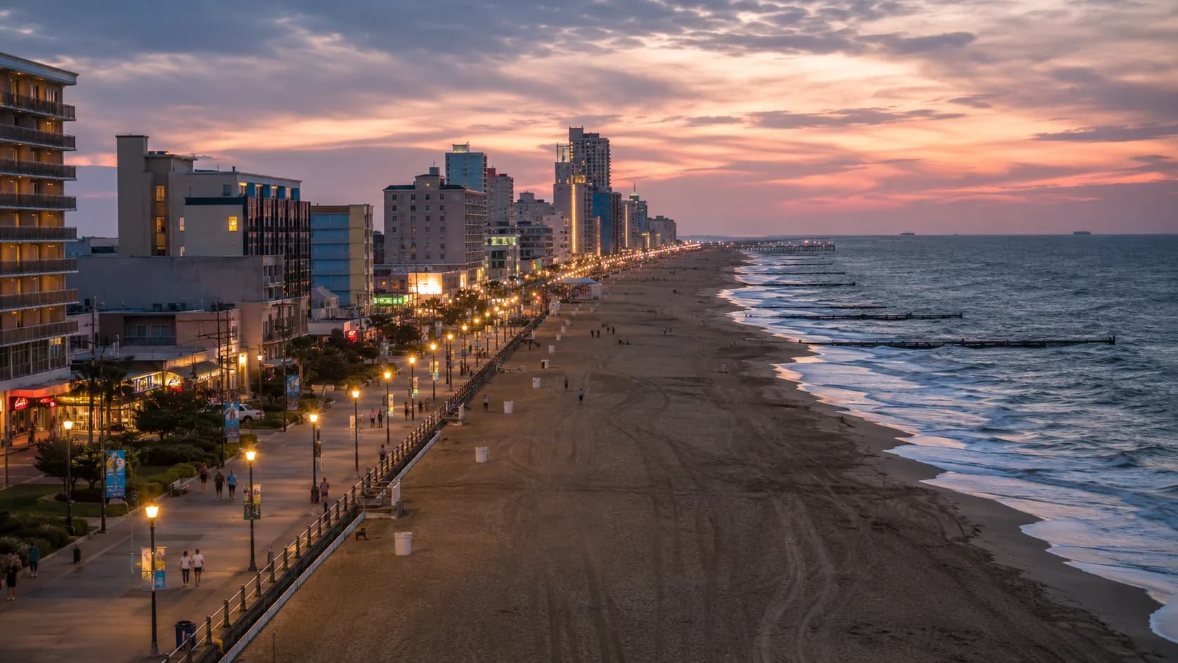 The Virginia Beach oceanfront and boardwalk at dusk