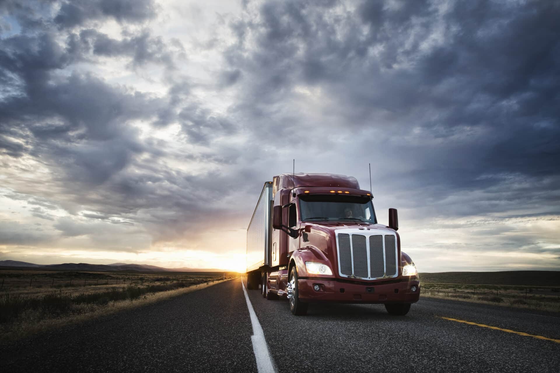 / front view of a commercial truck on the road at sunset in eastern Washington, USA